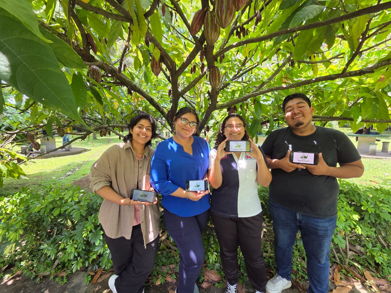 Agrismart team members collaborating in an agricultural technology environment, demonstrating innovation and commitment to sustainable farming practices
